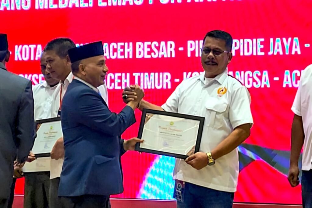 KONI Aceh Timur Raih Penghargaan Penyumbang Medali Emas di PON XXI
